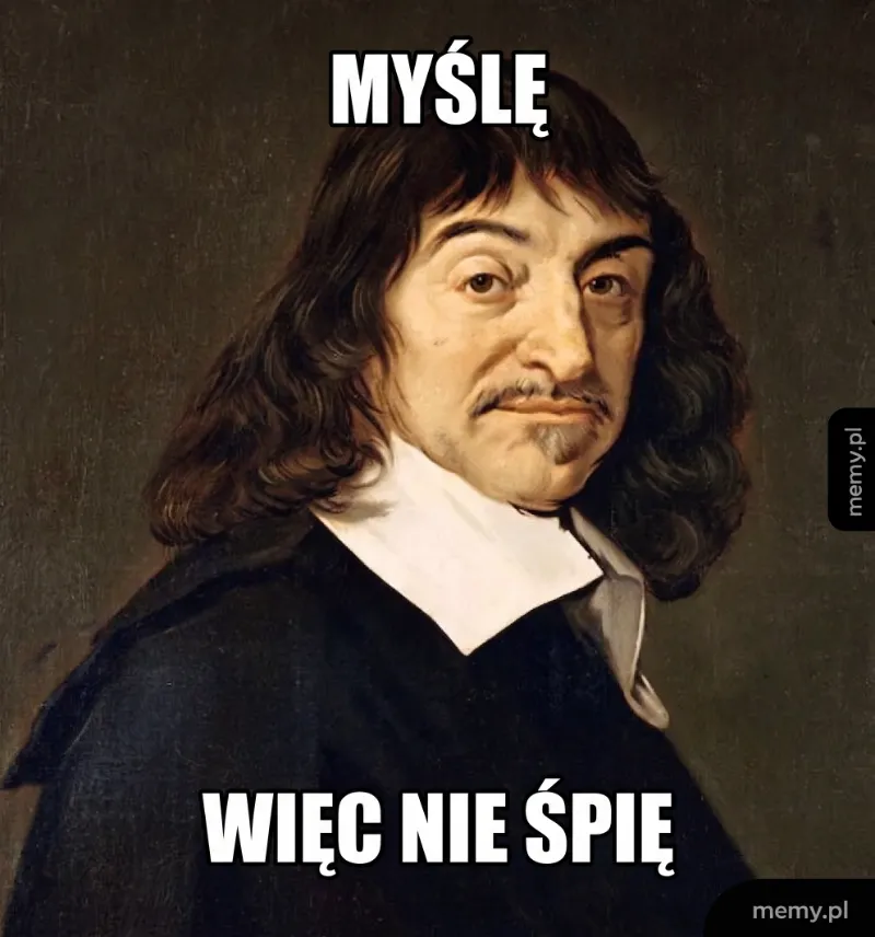 Mężczyzna z długimi włosami w czarnym płaszczu i białej koszuli.