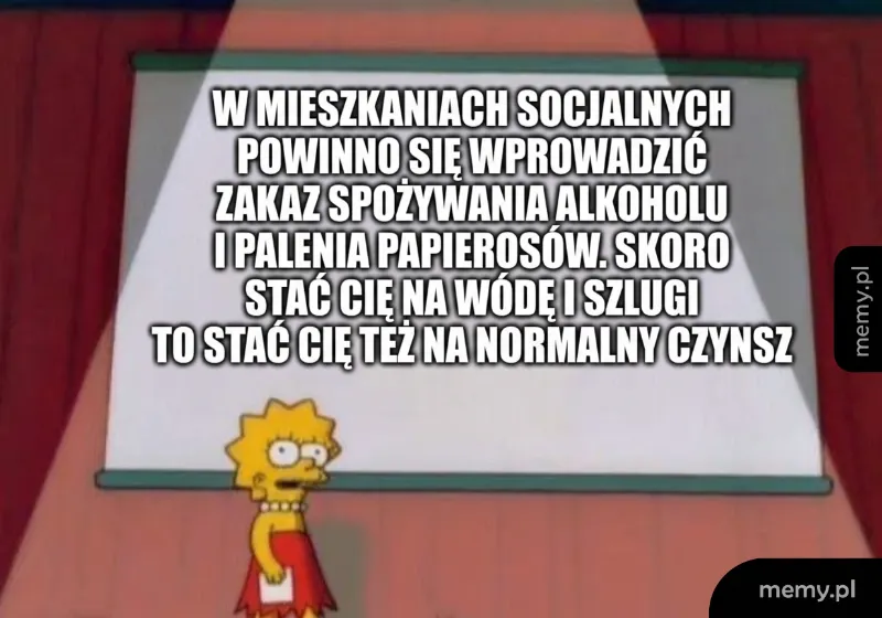 Kobieta stoi na scenie, mówi do publiczności.
