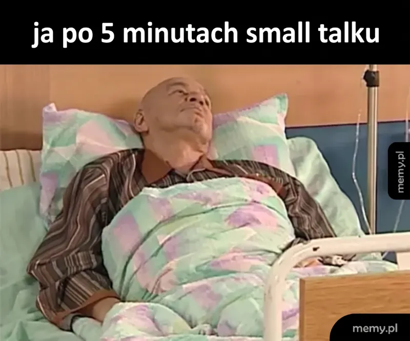 Mężczyzna w łóżku szpitalnym, wyglądający na znudzonego.