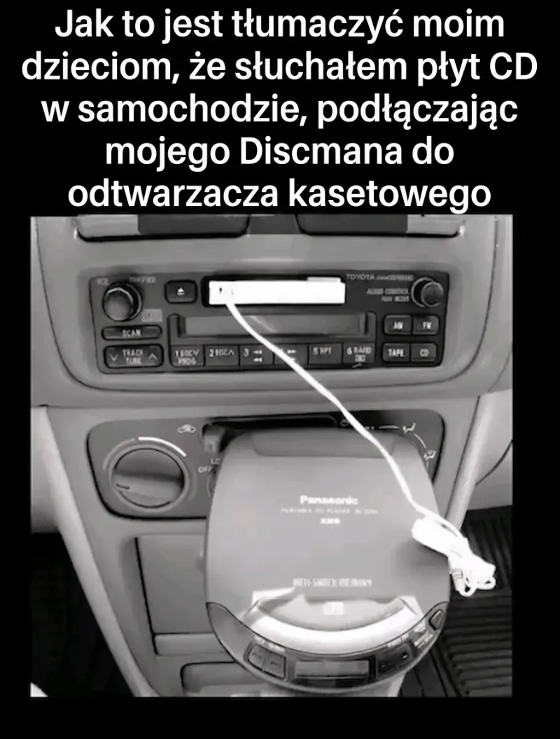 CD player connected to a cassette player in a car.